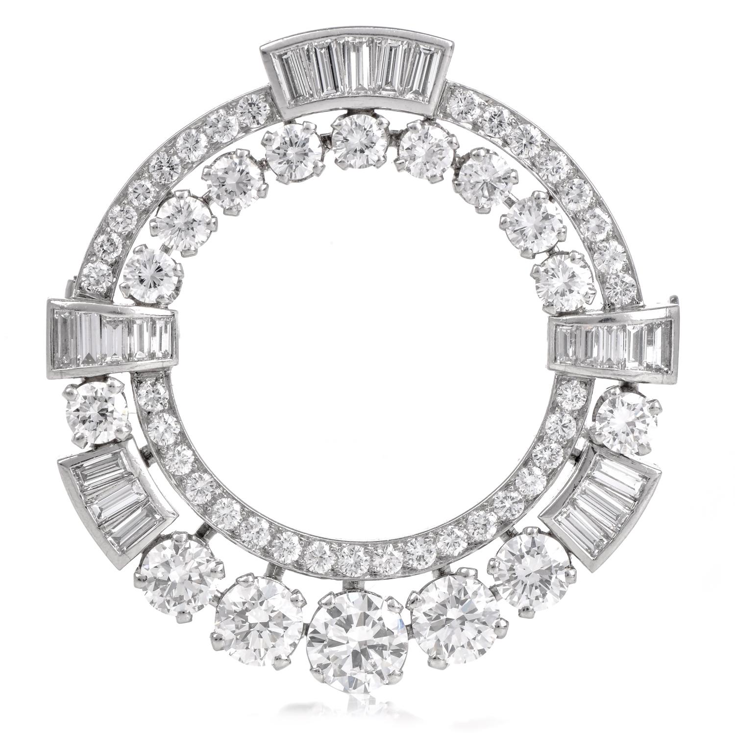 Estate Wreath Design pin decorated with natural earth-mined Round and Baguette cut Diamonds forged in Platinum. Secured with a side lock clasp pin.

Metal: Platinum

Measurements: 35mm x 33mm

Diamonds Weight Approx: 5.00 cttw

Color Grade Range: