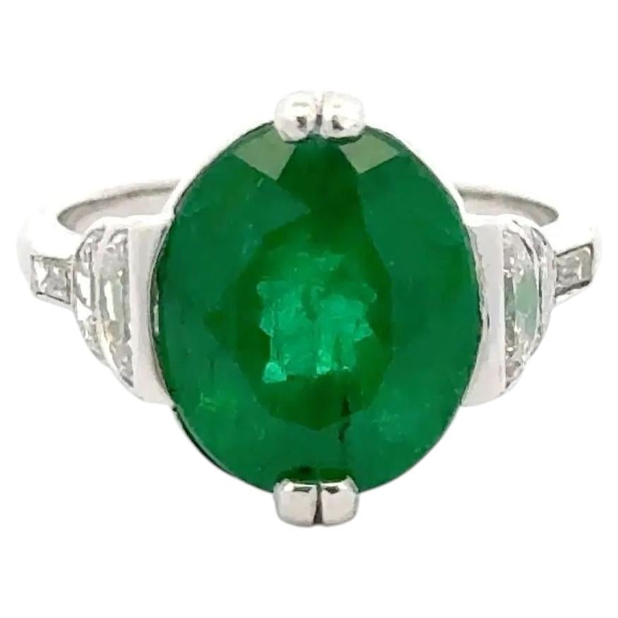Vintage 5.05 Carat Oval Emerald and Diamond Platinum Solitaire Cocktail Ring For Sale