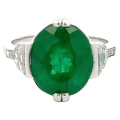 Vintage 5.05 Carat Oval Emerald and Diamond Platinum Solitaire Cocktail Ring