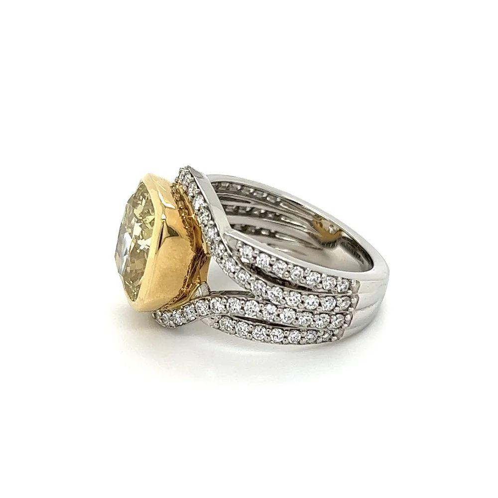 Women's Vintage 5.06 Carat GIA Natural Fancy Yellow Cushion Diamond Platinum Ring For Sale