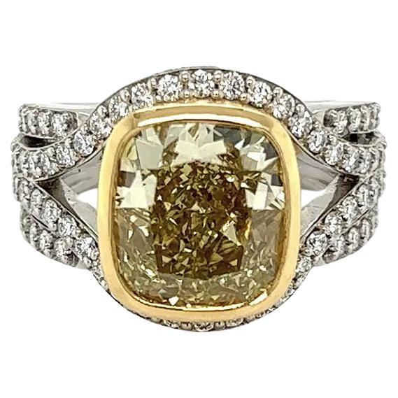 Vintage 5.06 Carat GIA Natural Fancy Yellow Cushion Diamond Platinum Ring For Sale