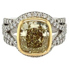 Vintage 5.06 Carat GIA Natural Fancy Yellow Cushion Diamond Platinum Ring