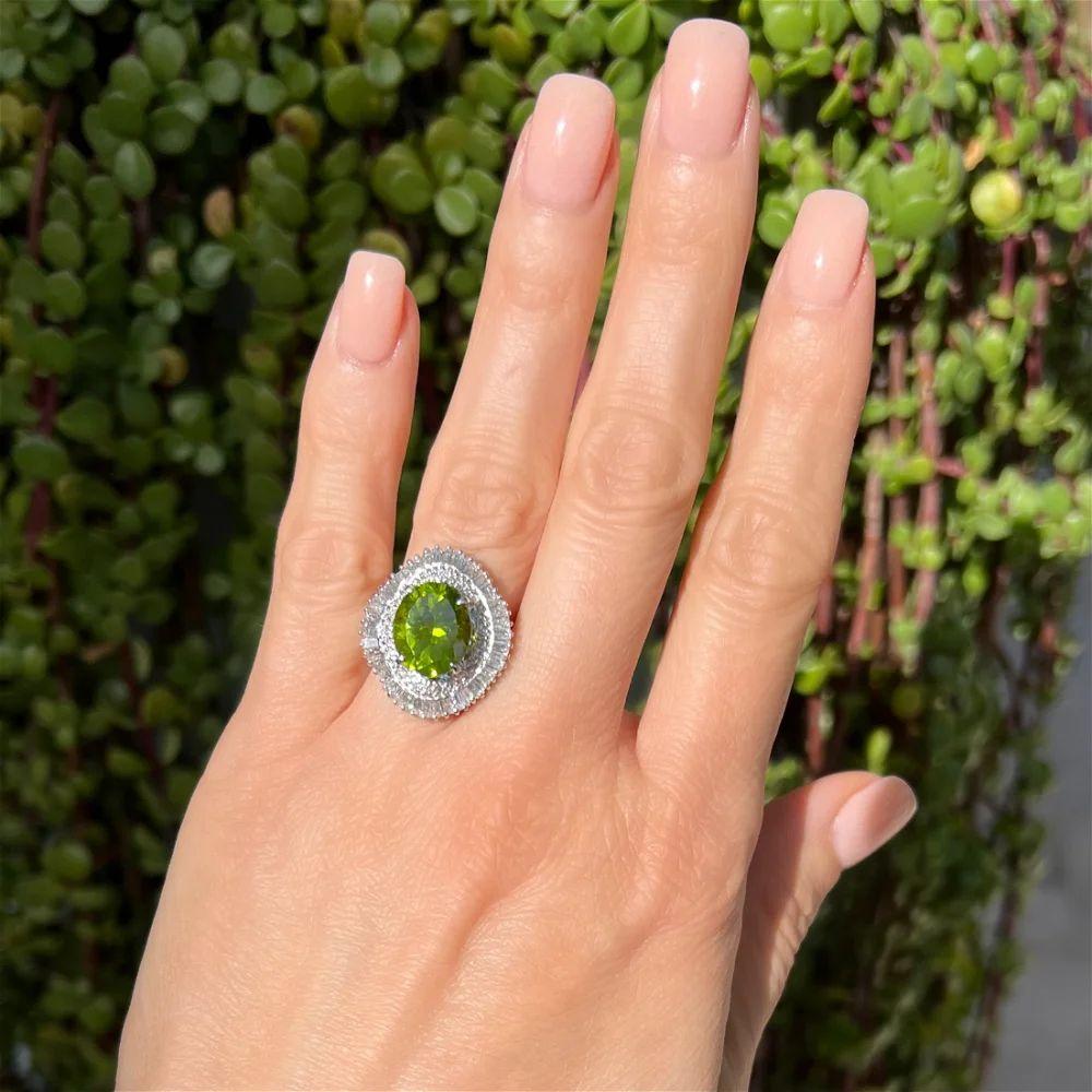 Modern Vintage 5.06 Carat Oval Peridot and Diamond Platinum Cocktail Ring For Sale