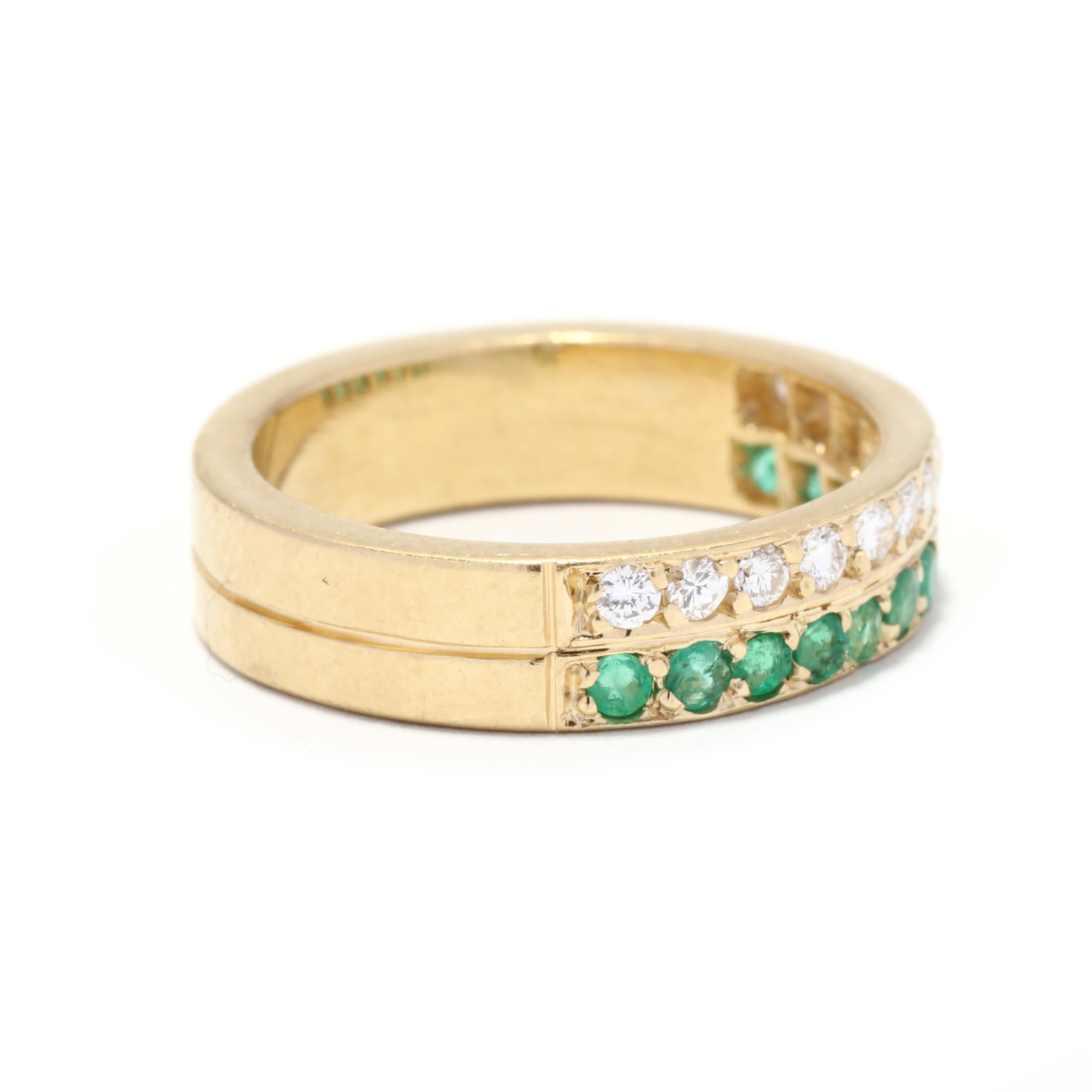 A vintage 18 karat yellow gold diamond and emerald double row band ring. This ring features one row of full cut round diamonds weighing approximately .25 total carats and another row of round cut emeralds weighing approximately .25 total carats and