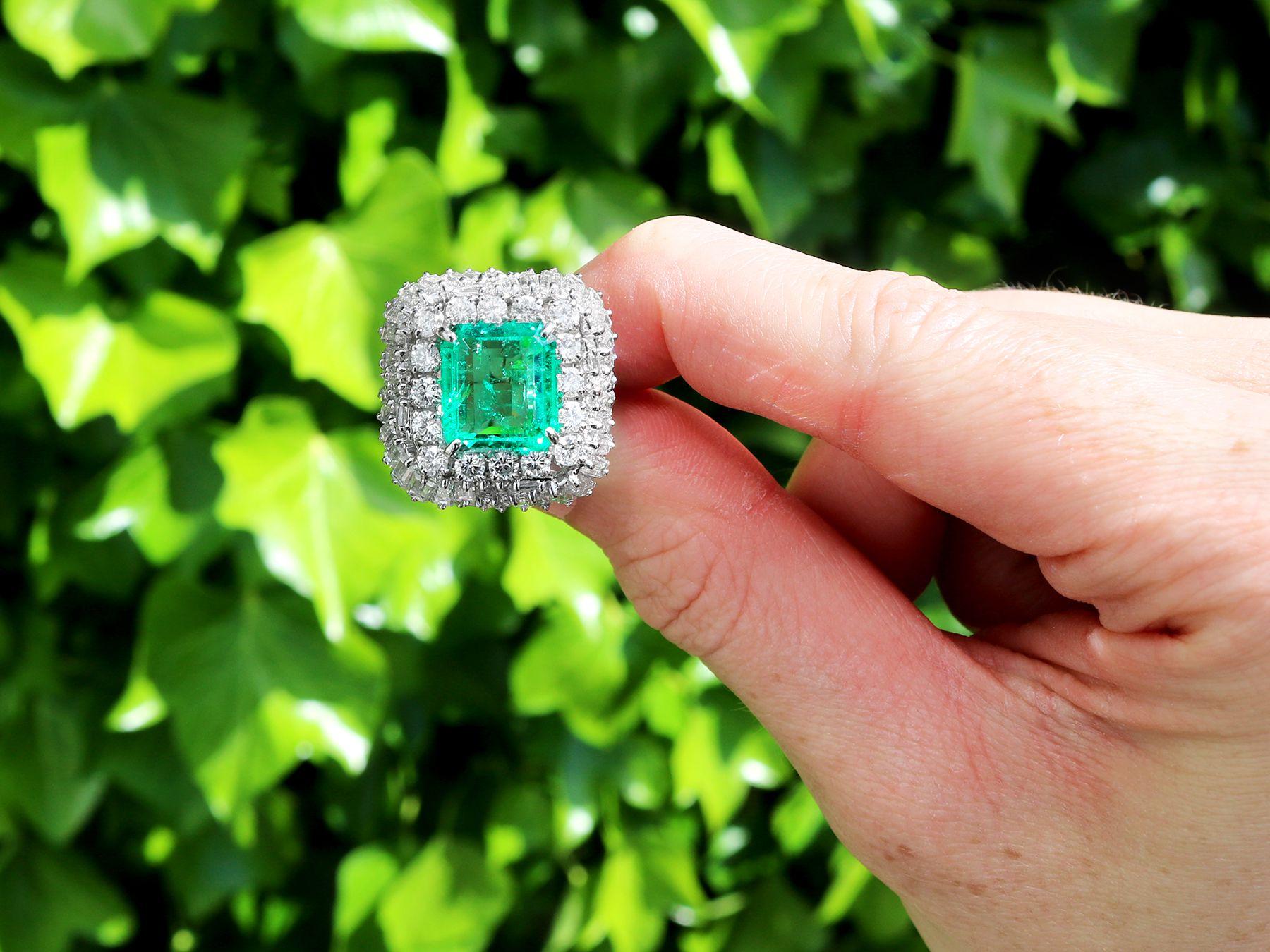 A magnificent, stunning, fine and impressive 5.11 carat Colombian emerald and 3.32 carat diamond, platinum dress ring; part of our diverse vintage jewelry collections.

This magnificent, stunning, fine and impressive vintage emerald ring has been