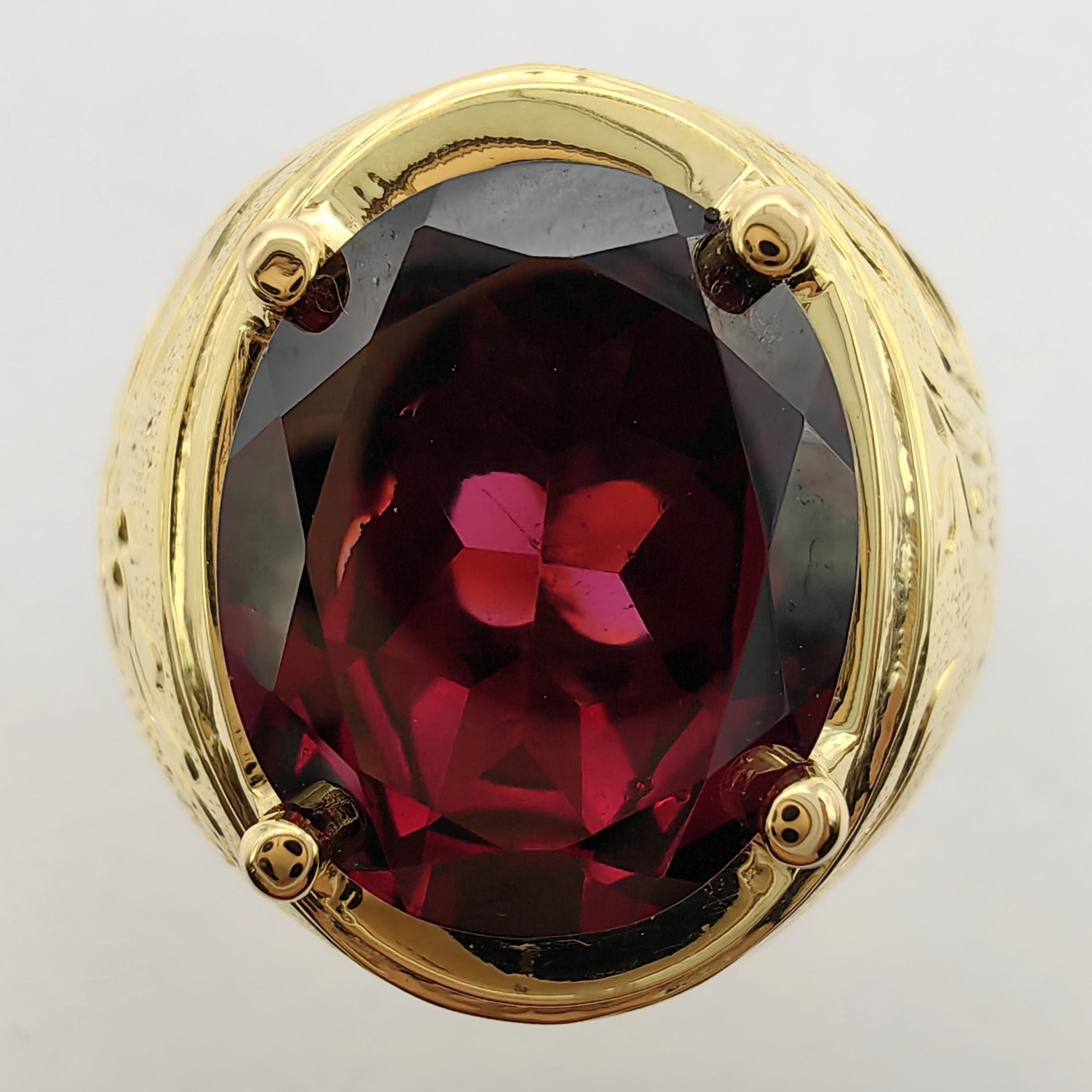 Introducing our Vintage 5.32 Carat Oval-cut Rubellite Dragon Phoenix Ring in 14K Yellow Gold, a symbol of strength, beauty, and timeless elegance.

This exceptional ring showcases a striking 5.32 carat oval-cut rubellite at its center, radiating a