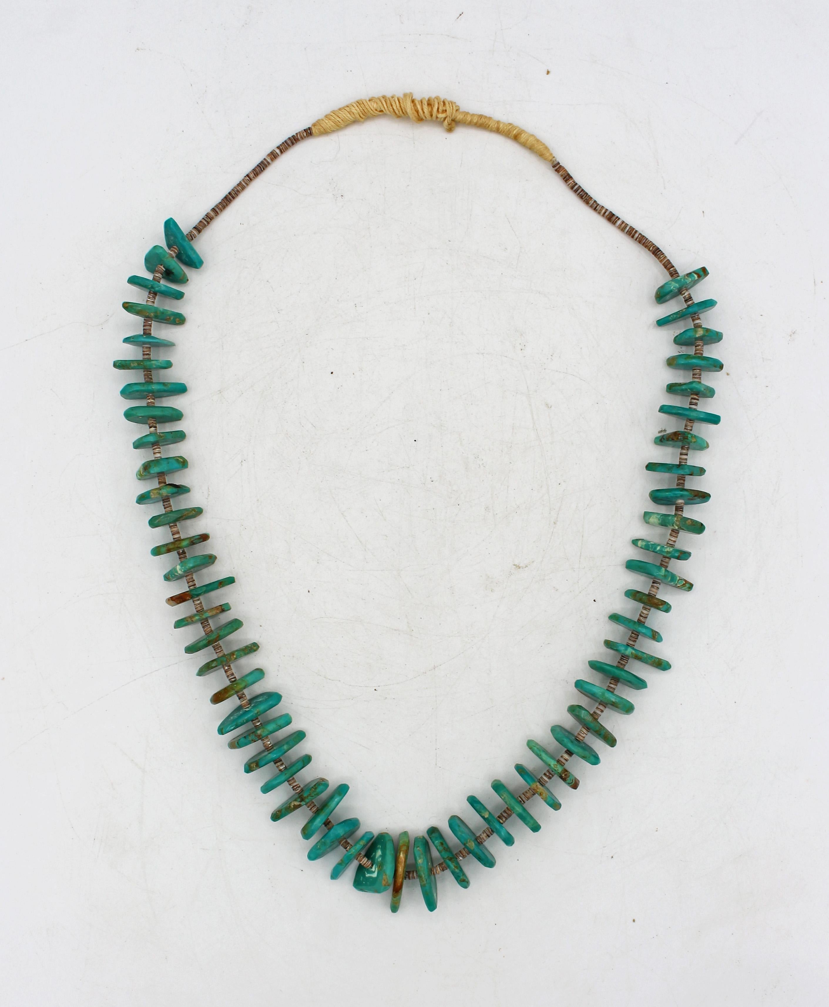 Vintage 55 stone untreated turquoise nugget necklace from the Kingman mine. Acquired on June 7, 1975 from Karen Hinton, Lancaster, PA. It has a double jocla as well simply draped over the necklace in typical Pueblo & Navajo style (the jocla could