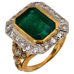 Anello cocktail d'epoca con smeraldo e diamante in oro giallo 18k da 5,60 carati