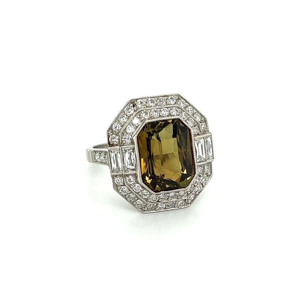 Simply Beautiful! Elegant and finely detailed Platinum Ring, centering a securely nestled Hand set, 5.68 Carat Emerald Cut Alexandrite. GIA report #2225972415. Surrounded by 4 French Cut Diamonds, weighing approx. 0.40tcw and 52 Old European Cut