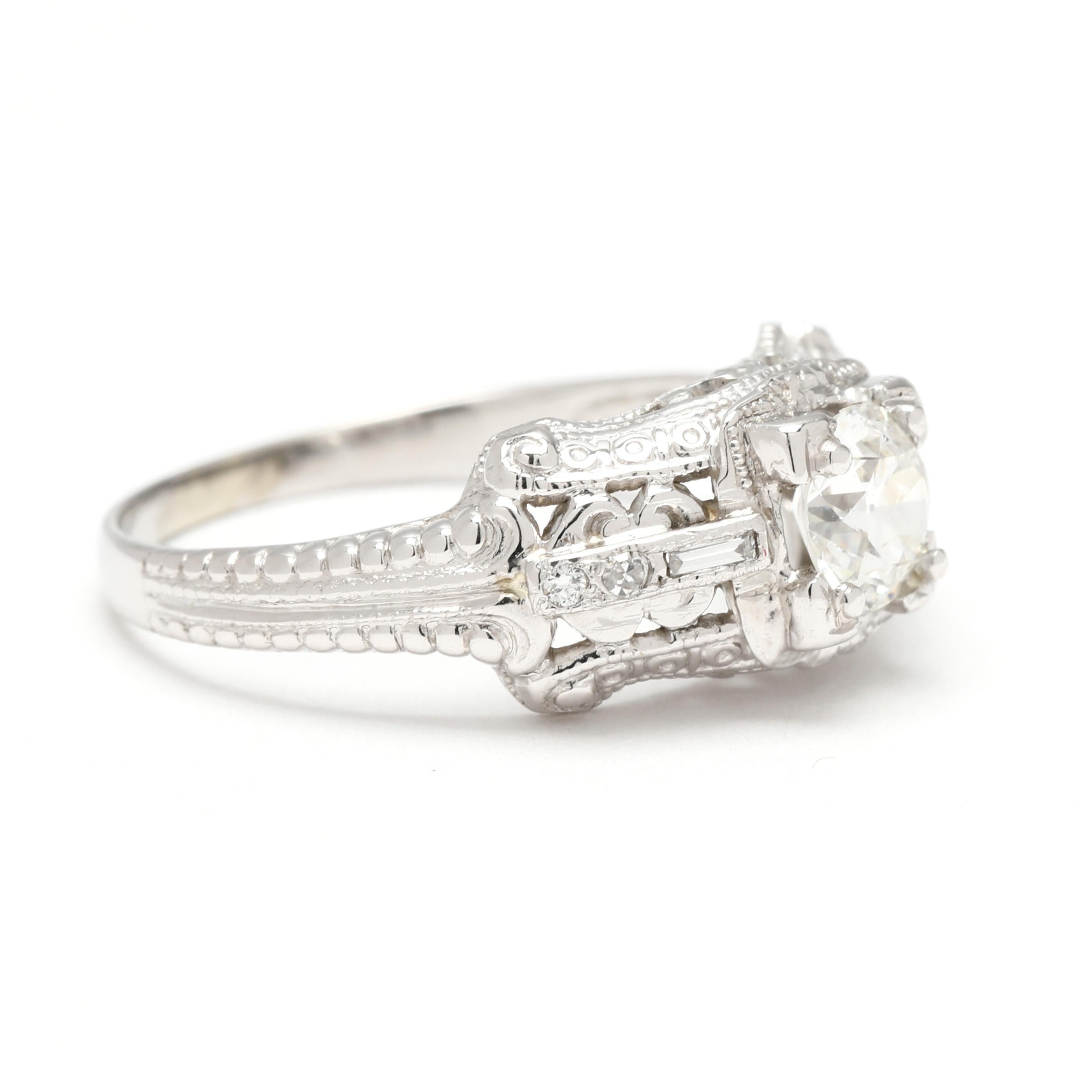 Steine:
Diamanten
alter europäischer Schliff, 1 Stein
4.75 mm
etwa .50 Karat
Farbe G-H, Reinheit VS2
Baguette, 2 Steine
2.25 x .75 mm
etwa 0,04 Karat insgesamt
Farbe G-H, Reinheit VS1-2
alter Einzelschnitt, 4 Steine
1.1 mm
etwa 0,02 Karat