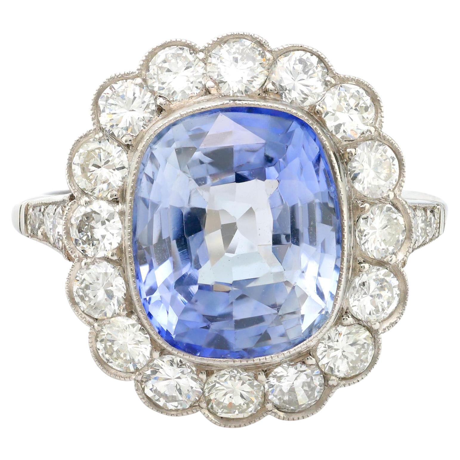 Vintage 5.70 carat sapphire diamond platinum halo ring