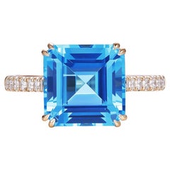 Bague vintage en or jaune 14 carats avec topaze bleue taille Asscher de 5,74 carats et diamants