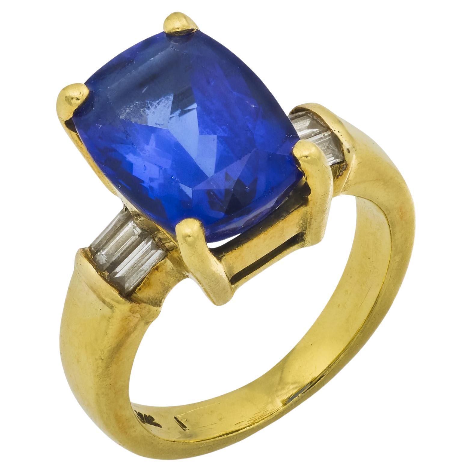 Anello cocktail d
epoca con tanzanite e diamante in oro giallo 18k da 5,85 carati