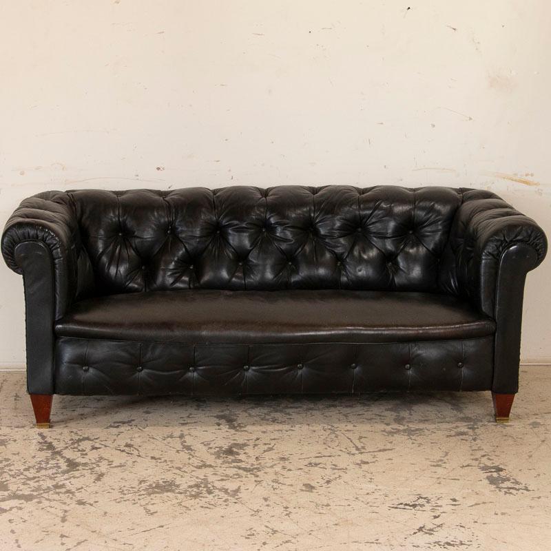 The unique appeal of vintage leather over something new is difficult to describe, but it is the aged, worn look that comes slowly over time that creates the depth of character in a wonderful leather sofa such as this one. Added to the classic style
