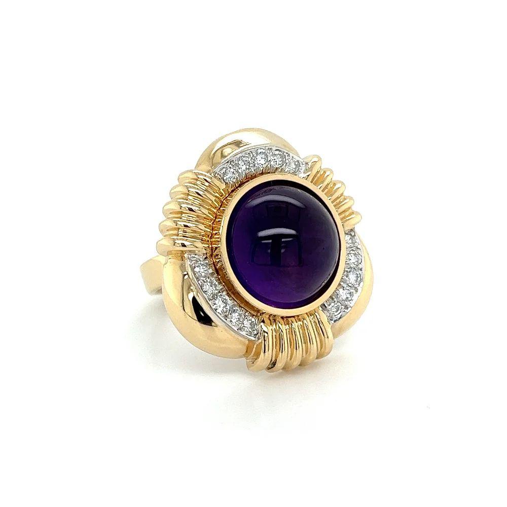 Simply Beautiful! Vintage Solitaire Amethyst and Diamond Retro Gold Ring. Centering a securely nestled and Hand set 6 Carat Round Cabochon Amethyst. Surrounded by alternating Gold Triangular designs and Diamonds, weighing approx. 0.75tcw. Hand