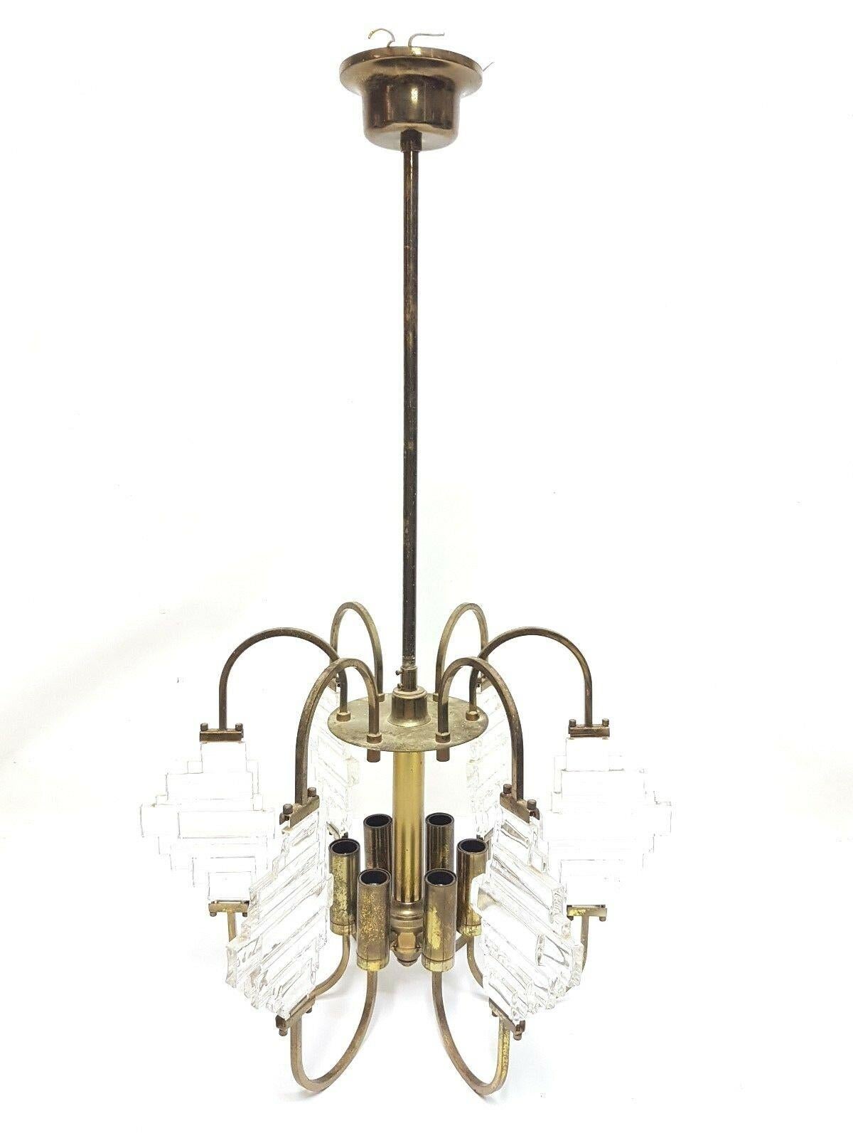 6-light chandelier design Stilkronen, 1960s

Original 60s chandelier, stilkronen production, burnished brass structure
And six tiered glass manufacturing

It measures 40 cm only the luminous part, total height 85 cm

Glass in perfect