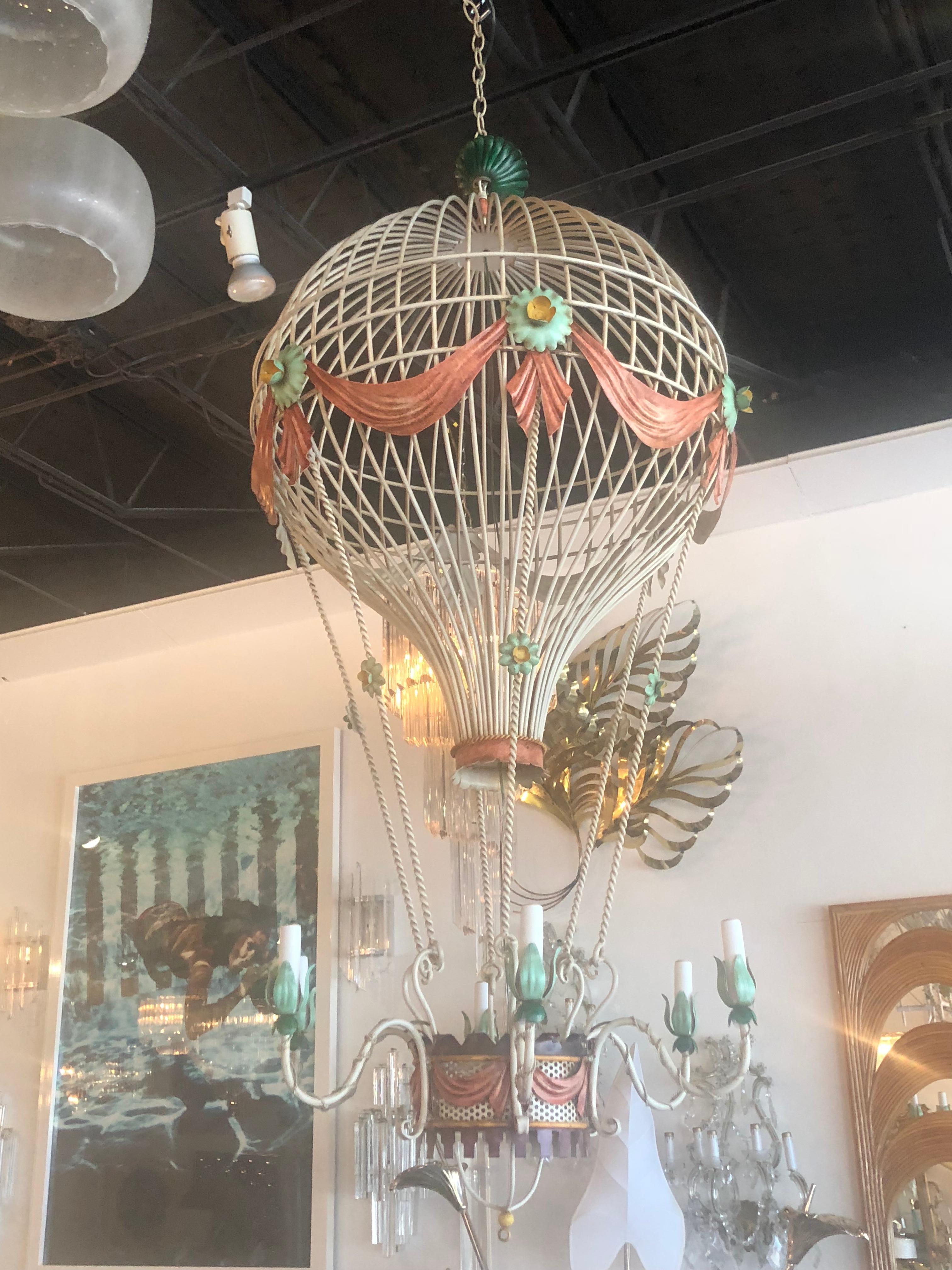 Beautiful vintage 6-light Italian tole metal chandelier. Comes with original chain and ceiling canopy. Lampshades included.
 