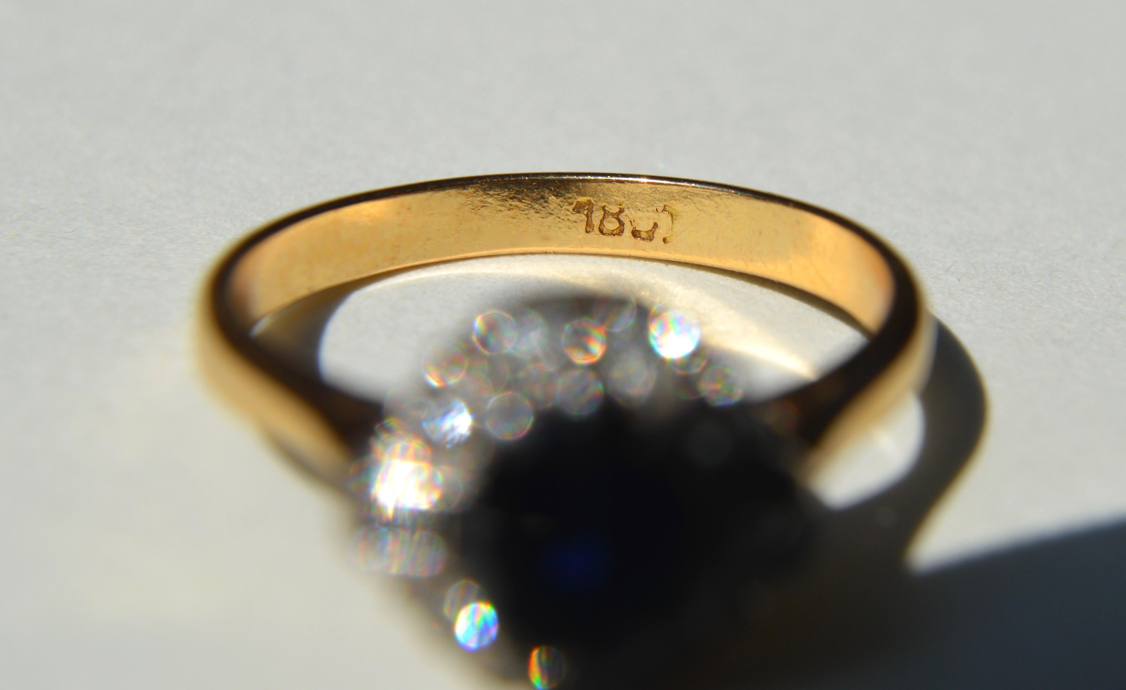 Oval Cut Vintage .61 Carat Sapphire Diamond Halo 18 Karat Gold Engagement Ring