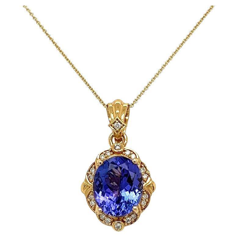 Vintage 6.50 Carat Oval Tanzanite and Diamond Gold Drop Pendant Necklace For Sale