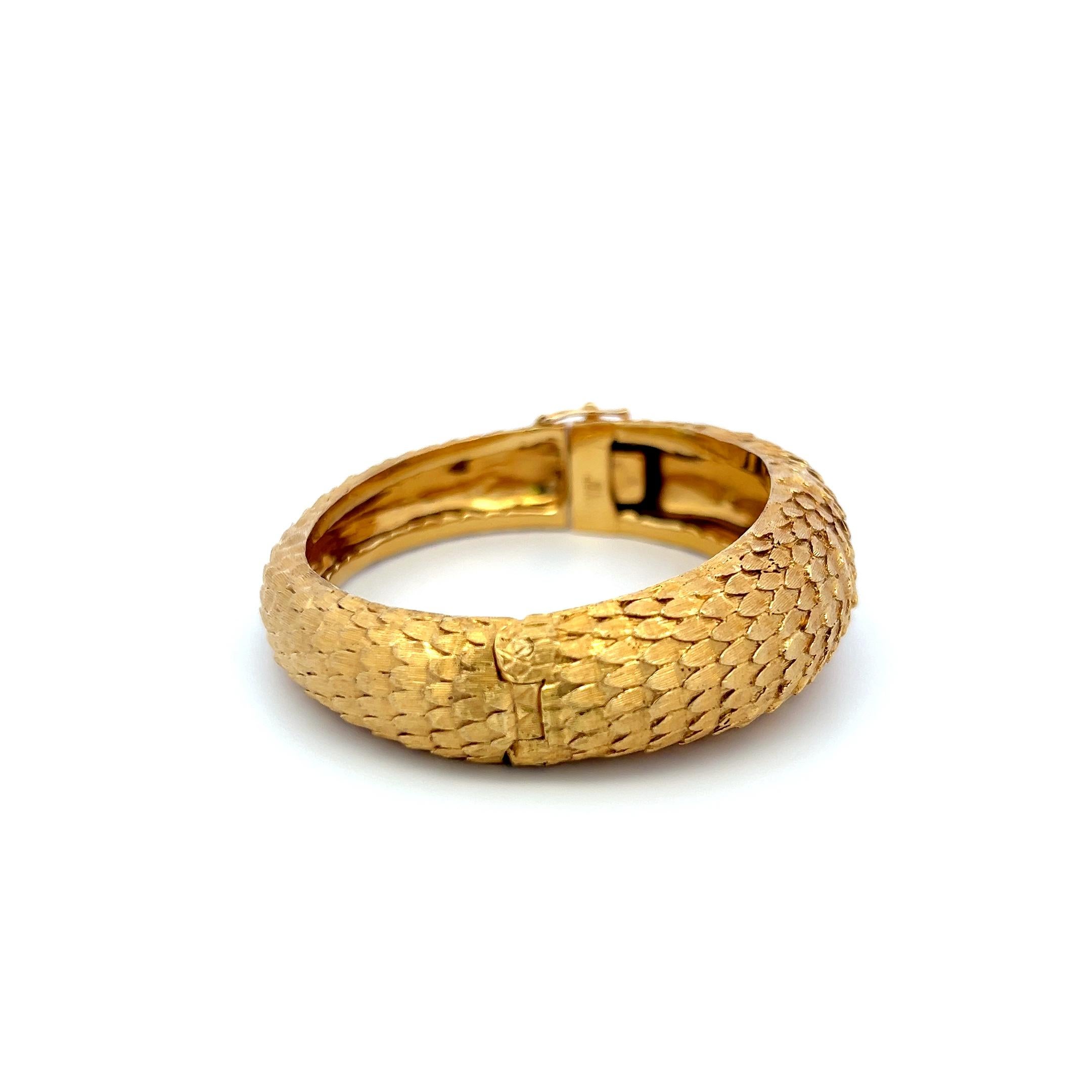 Title:
18 Karat Yellow Gold Bangle Bracelet
Style:
Bangle
Metal:
18 Karat Yellow Gold
Dimension:
6.25*0.68*0.32IN
Weight:
65.5 Grams
Condition:
Vintage And Estate
Product ID:
5J1158
Note:
Please note that all the non-GIA Gemstones' Weight, Color,