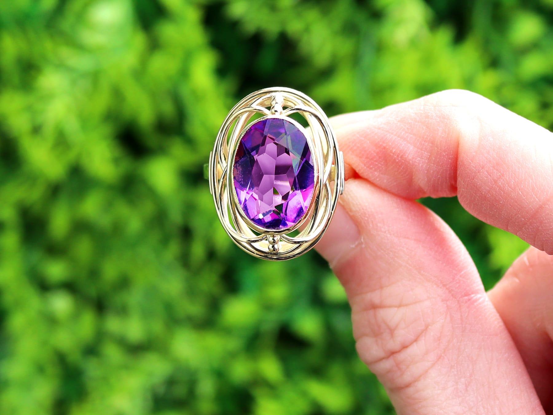 A fine and impressive vintage 6.91 carat amethyst and 14 karat yellow gold dress ring; part of our diverse collection of vintage amethyst jewellery.

This fine and impressive oval amethyst ring has been crafted in 14k yellow gold.

The pierced