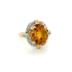 Vintage 6.92 Carat Vivid Orange Yellow Sapphire and Diamond Ring