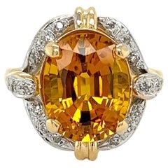 Bague Vintage 6.92 Carat Vivid Orange Yellow Sapphire and Diamond