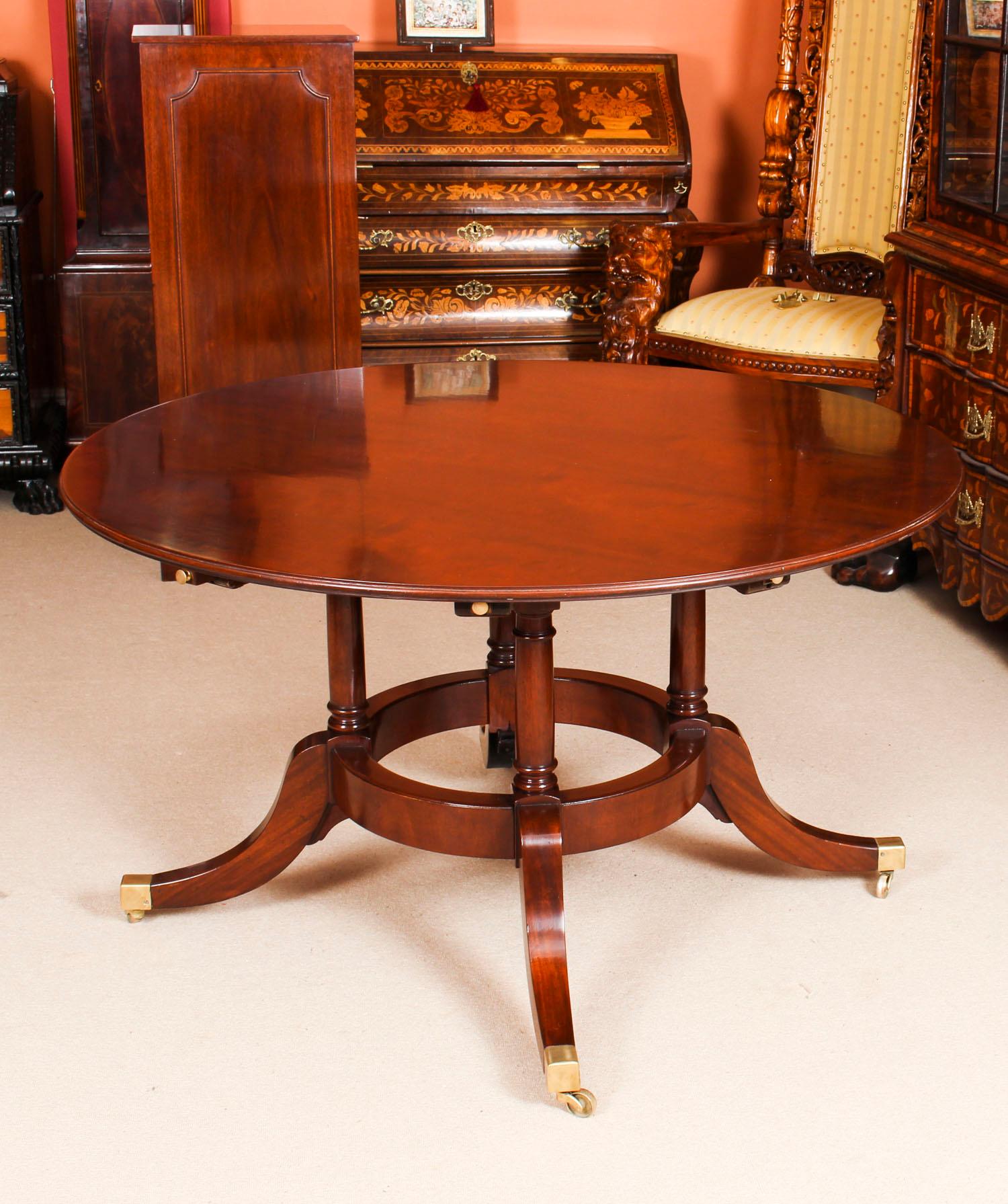 English Vintage 6ft Diam Mahogany Jupe Dining Table & Leaf Cabinet. Mid 20th C