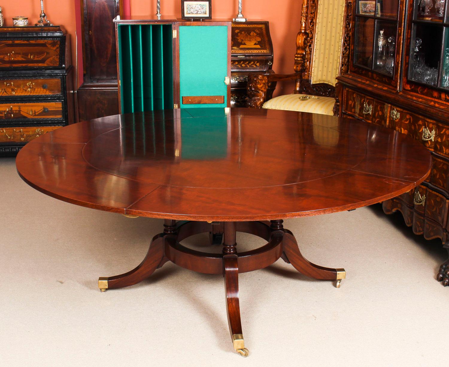 Mid-20th Century Vintage 6ft Diam Mahogany Jupe Dining Table & Leaf Cabinet. Mid 20th C