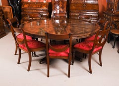 Mesa vintage de caoba flameada de 1,80 m de diámetro y 8 sillas de Rackstraw Siglo XX