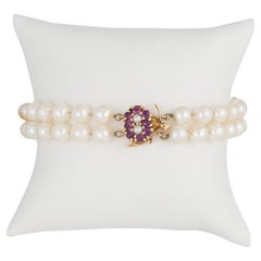 Bracciale vintage di perle coltivate e rubini in oro giallo 14k a 2 fili
