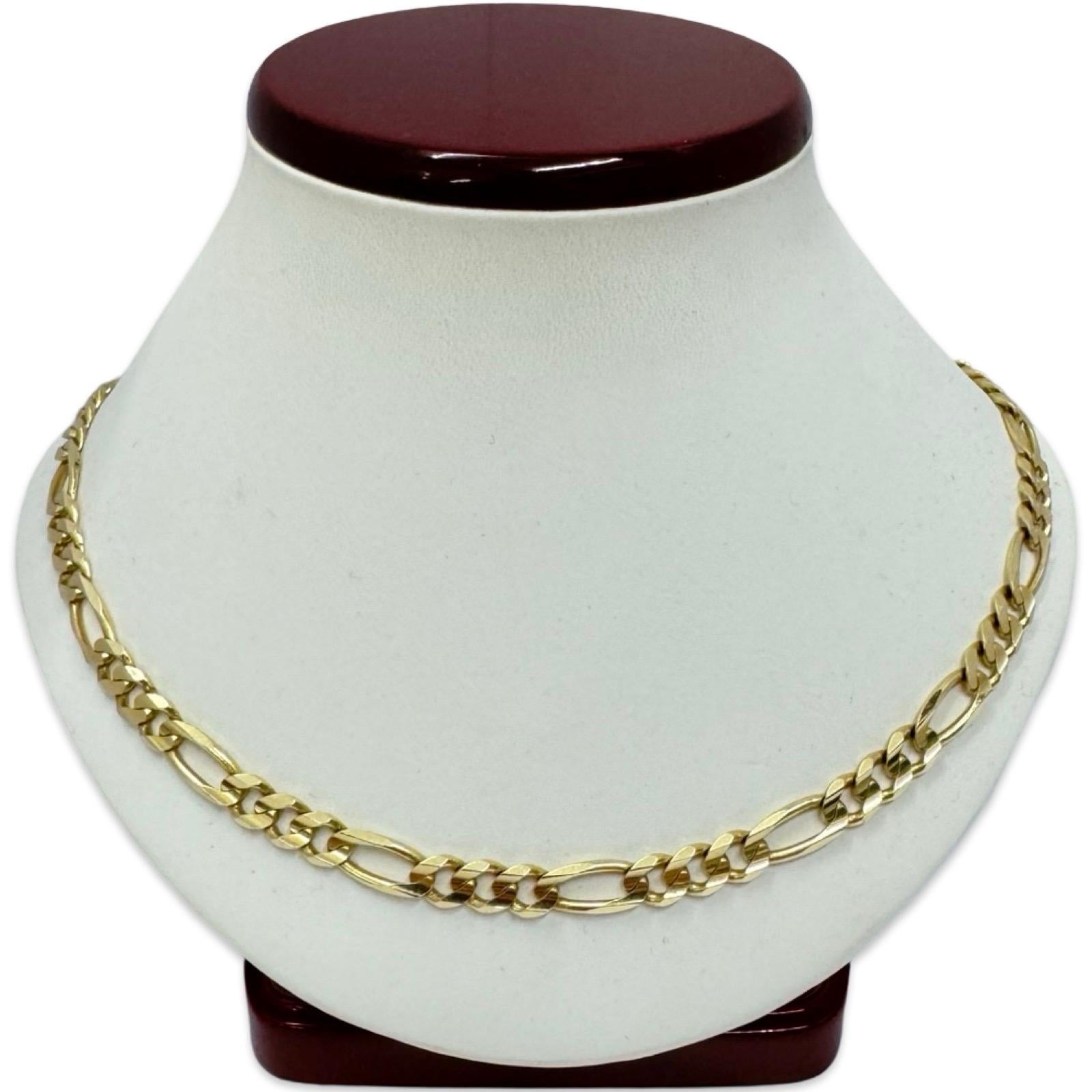 This stunning 14K yellow gold Figaro chain necklace is a timeless piece crafted in Italy, featuring a maker’s mark stamped “OM.” Weighing 20.1 grams and measuring 16 inches in length with a 6mm width, it offers a bold yet refined look. The classic