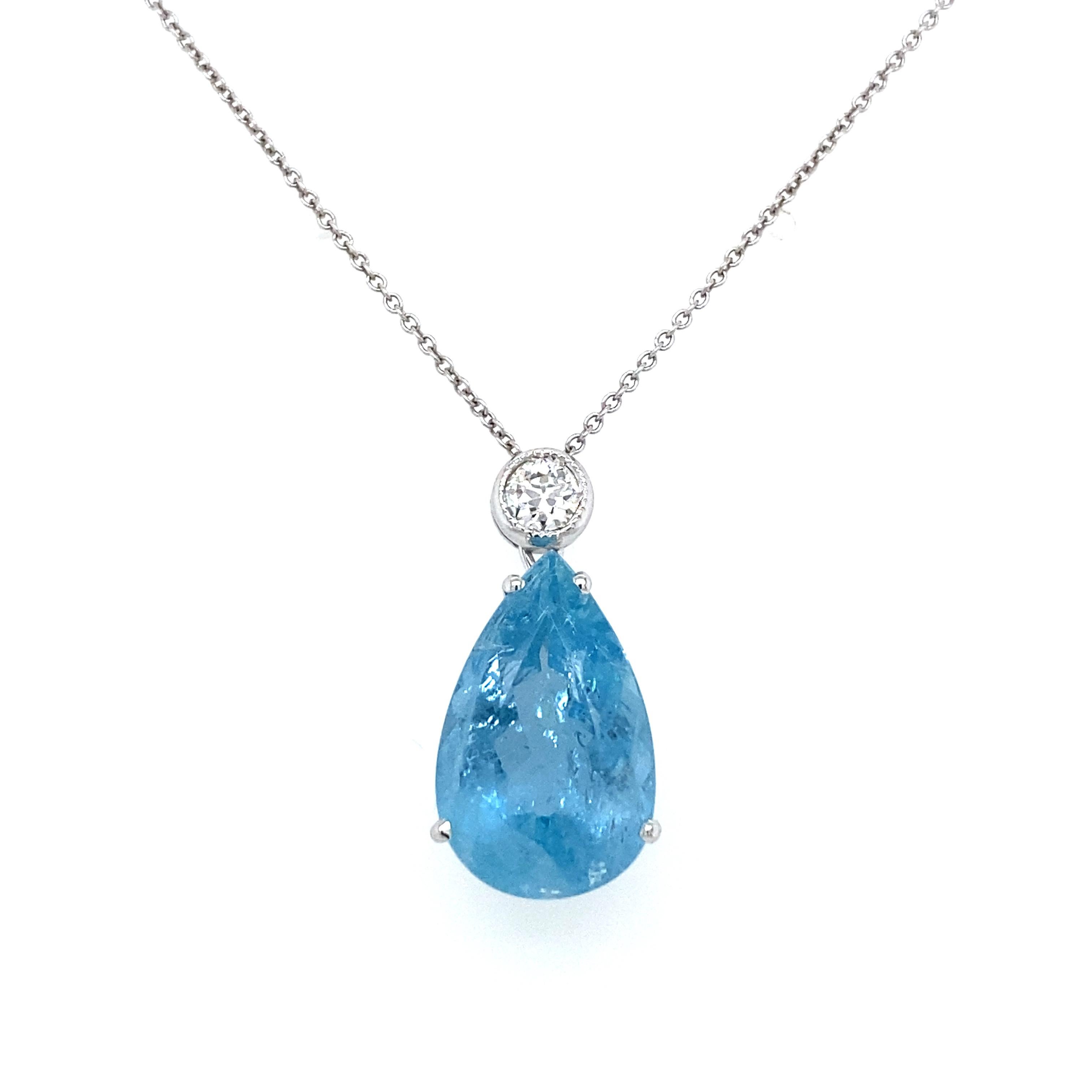 An impressive vintage 1960's 18k white gold necklace set with one large exquisite pear shape Natural Aquamarine, for a total weight of 7,20 Carats, surrounded by one large old mine cut Diamond in a white gold setting, weight 0,35 carats, graded H/I