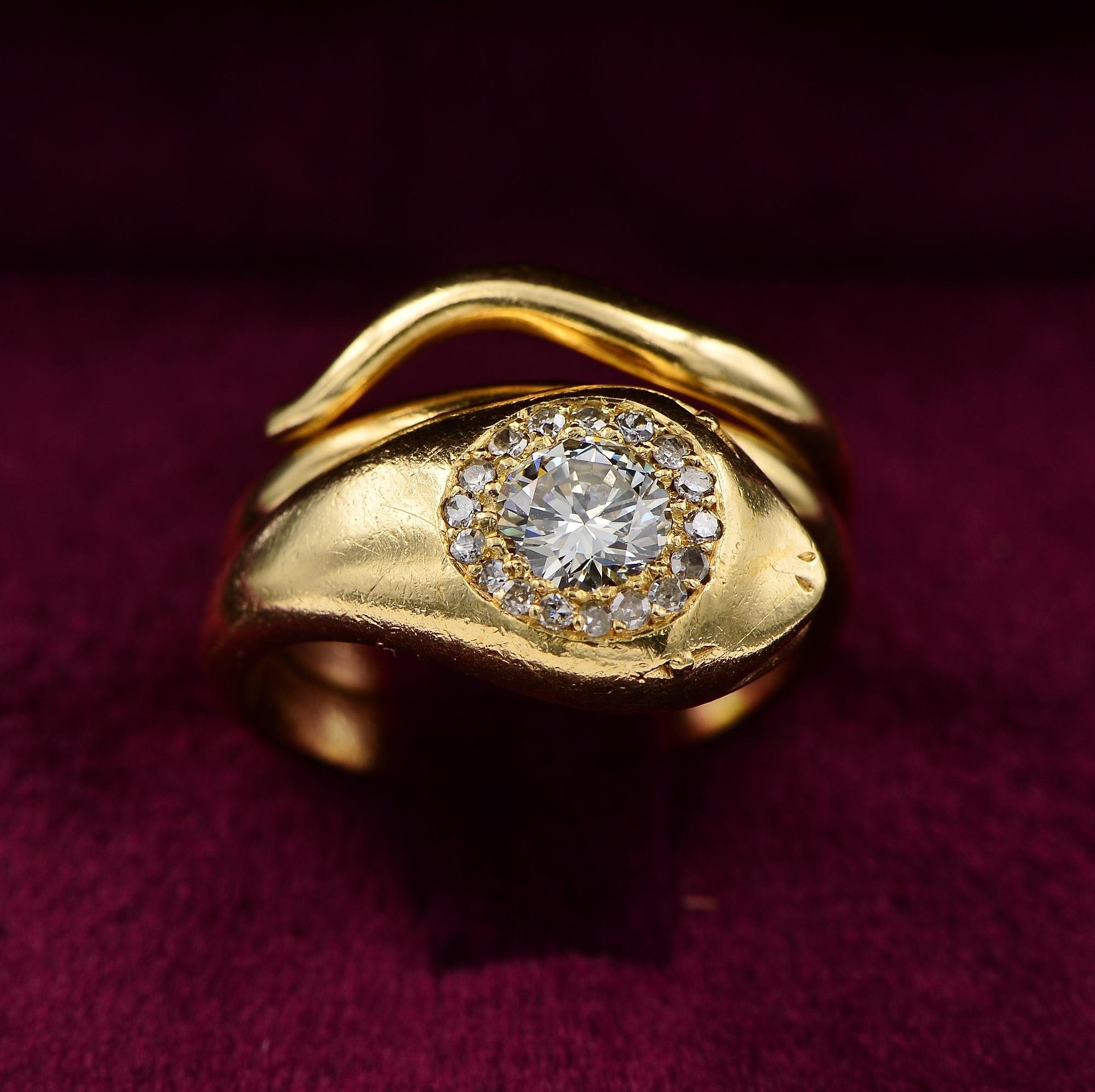 Popular throughout history, meaningful love token, snakes represent eternity and symbolic for many cultures
This beautiful vintage coiled snake Diamond ring is 1920 ca, hand crafted of solid 18 Kt gold
Jewelled head holding a primitive early