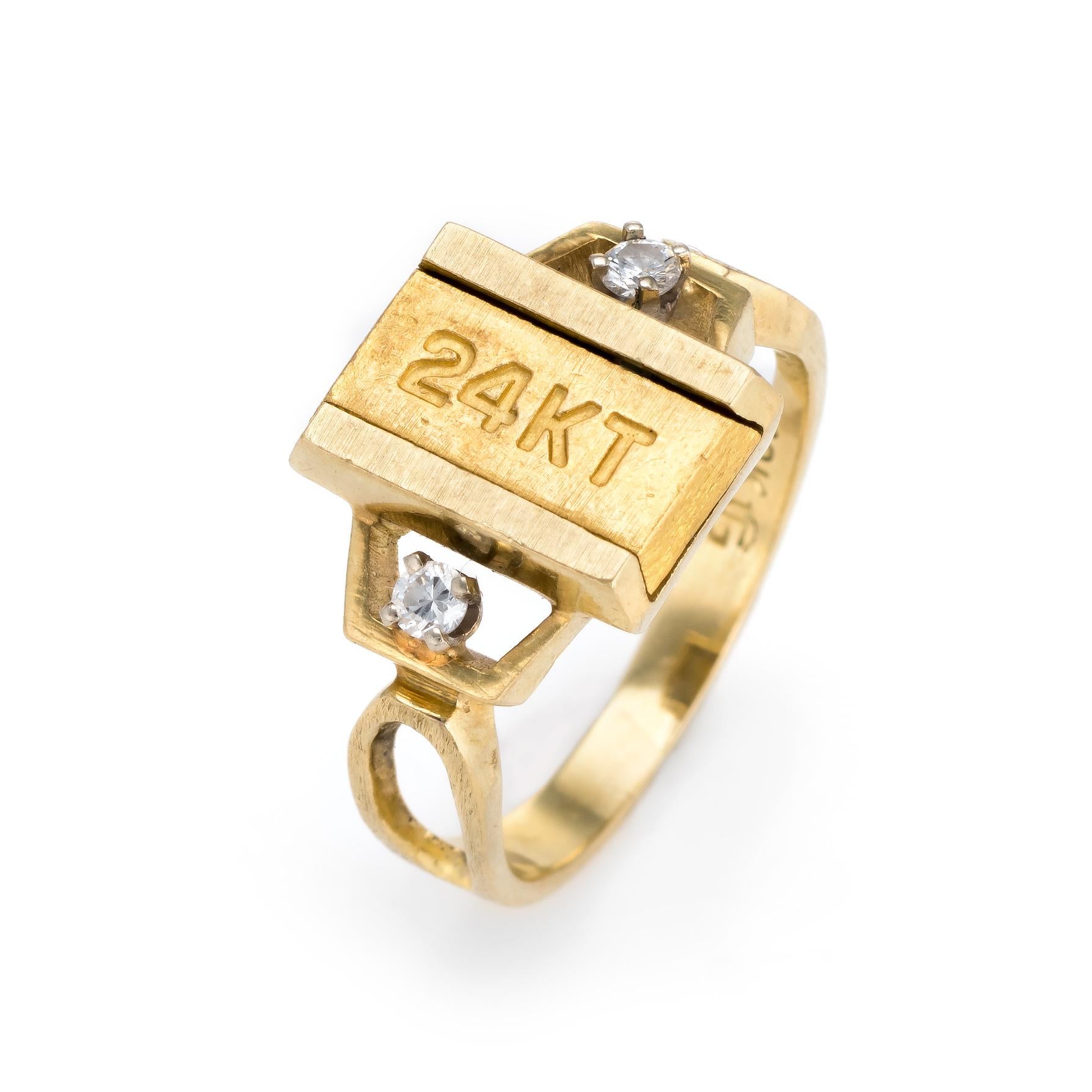 Distinct and fun 1970s era ring crafted in 24 karat and 18 karat gold. 

Two estimated 0.03 carat round brilliant cut diamonds total an estimated 0.06 carats (estimated at I-J color and SI1-2 clarity).  

A 24 karat gold bar is set flush into the