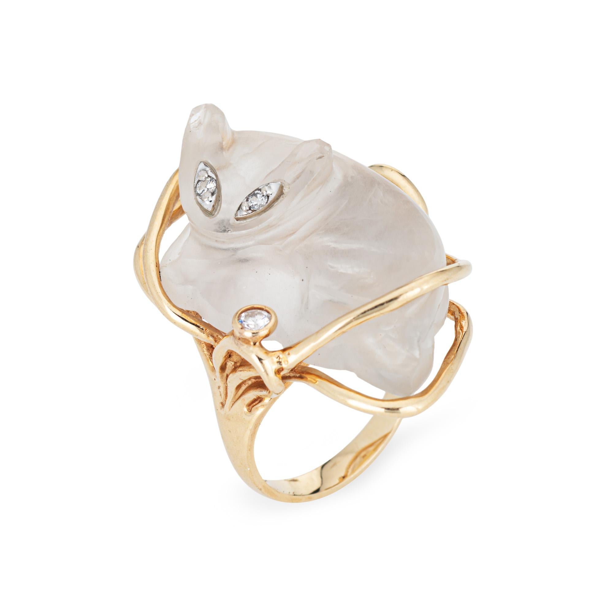 Distinct and stylish rock crystal cat ring crafted in 14 karat yellow gold (circa 1974). 

Rock crystal measures 30mm x 20mm. Diamonds total an estimated 0.04 carats (estimated at H-I color and SI1-2 clarity). Note: few small chips to cat's ears