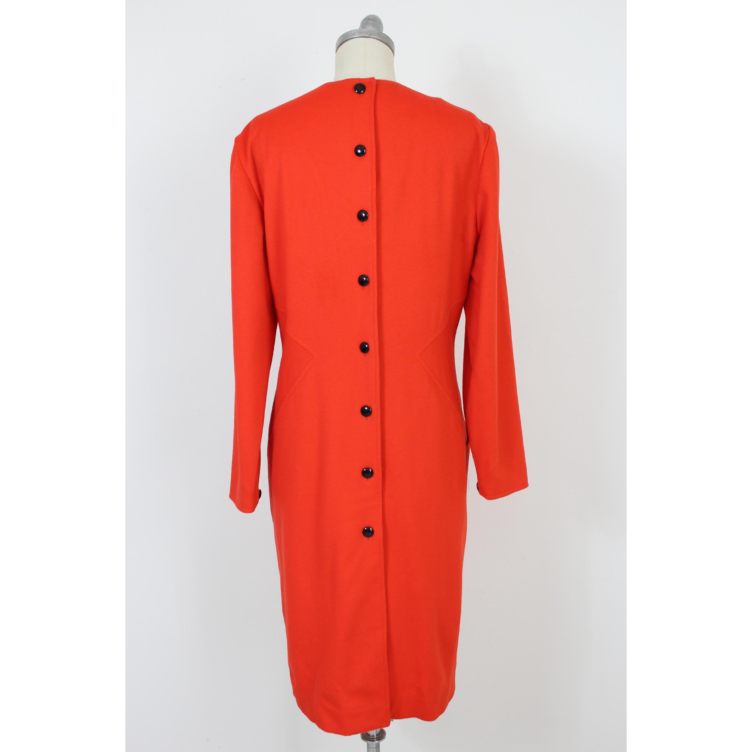 Vintage women's 70s dress Dani. Red long evening dress, 100% pure wool. Closing with black buttons over the entire length of the dress, V-neckline, pockets on the sides. Made in Italy. New with tag.

Size: 46 It 12 Us 14 Uk

Shoulder: 46