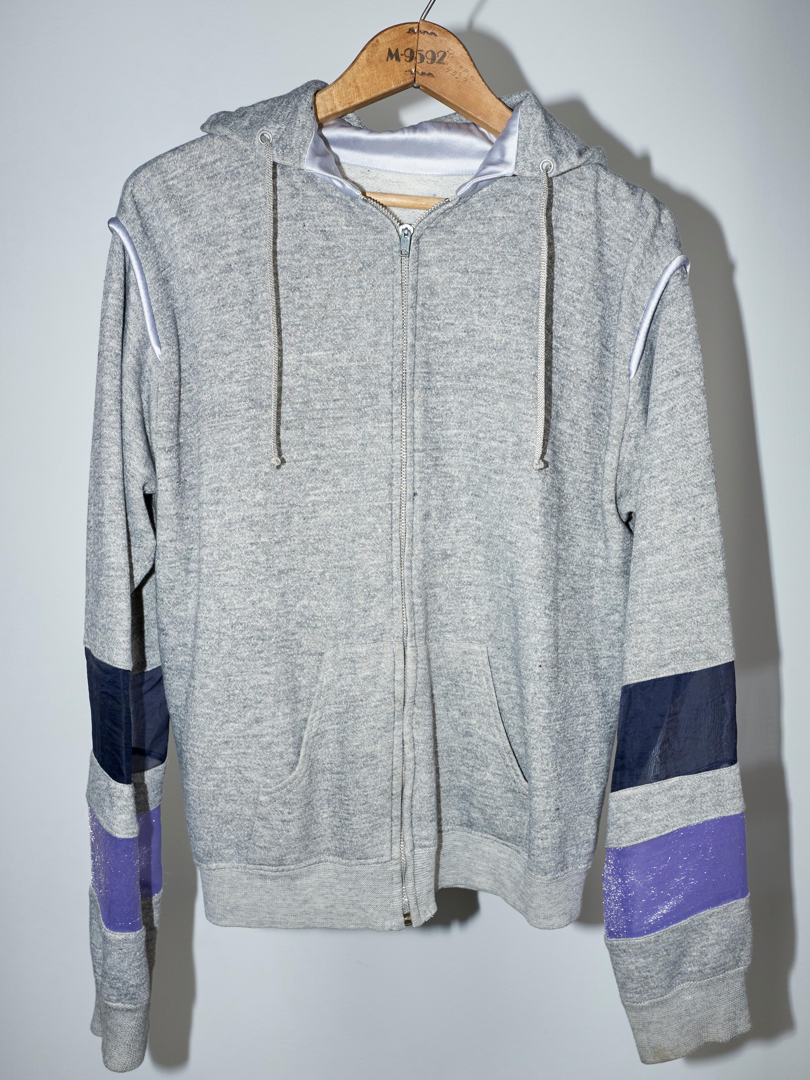 Brand: J Dauphin
One of a kind 
Embellished J Dauphin - Grey Zipper Hoodie Organza Inserts Lilac Blue Silk Details
Material: 50/50 Cotton 
Embellished Sleeve with Organza Details
Hoodie from the 60-70's Made in US

J Dauphin was created 2006 by