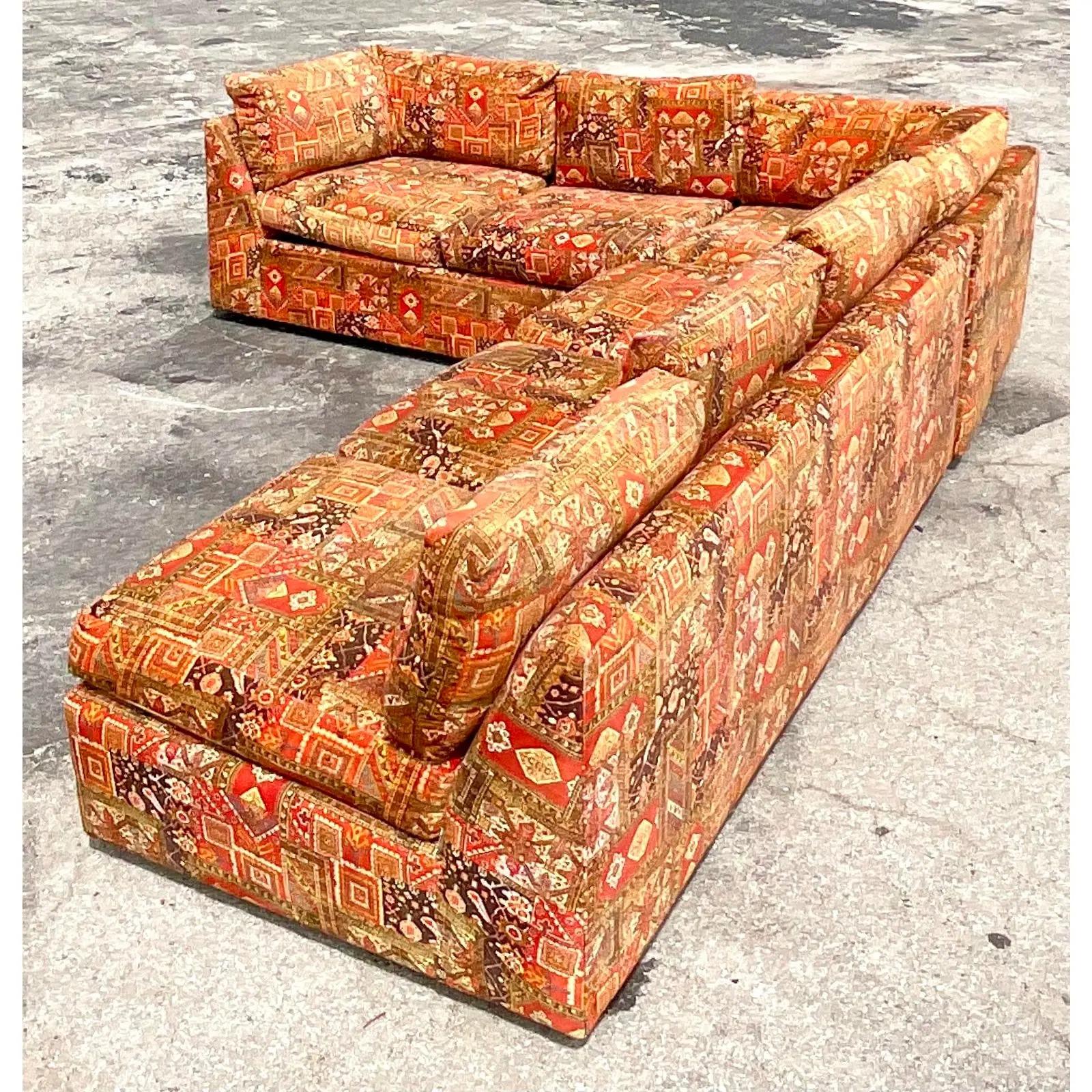 Incredible vintage 70s printed sectional sofa. Designed by the iconic Milo Baughman for the equally iconic Maker Thayer Coggin. Fantastic vintage print in deep sexy colors. A real showstopper. Makers mark under the cushions. Acquired from a Palm