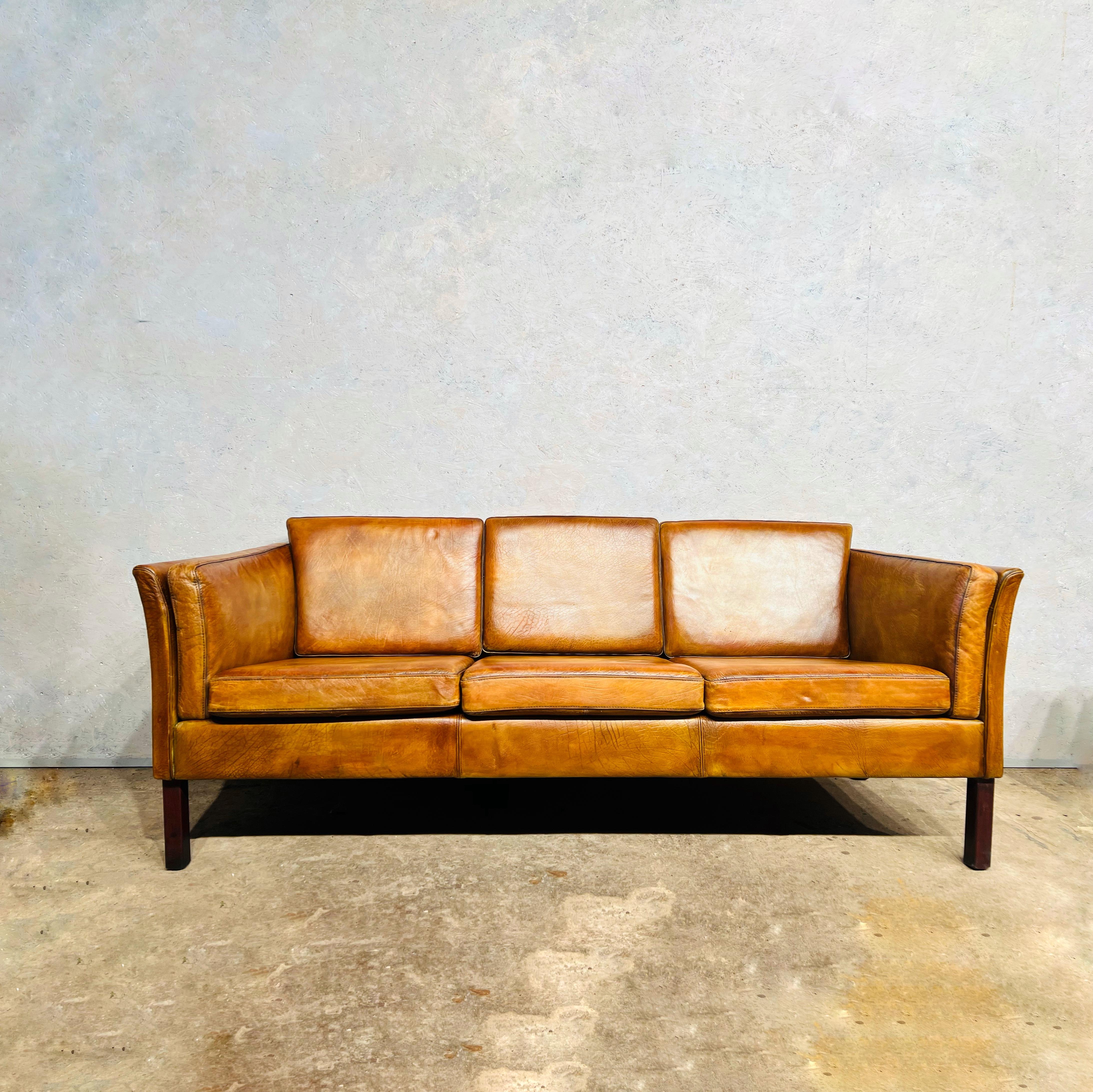 A Stylish 1970s sofa, great design with beautiful lines, sits wonderfully.

The leather is a Stunning hand dyed light tan color and has a great patina and finish.


