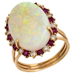 Vintage 7.15 caVintage 7.15 carat opal diamond ruby 14k yellow gold cluster ring