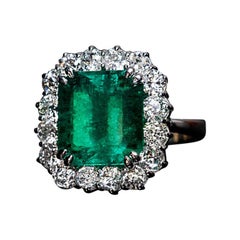 Vintage 7.31 Carat Colombian Emerald Diamond Cluster Engagement Ring