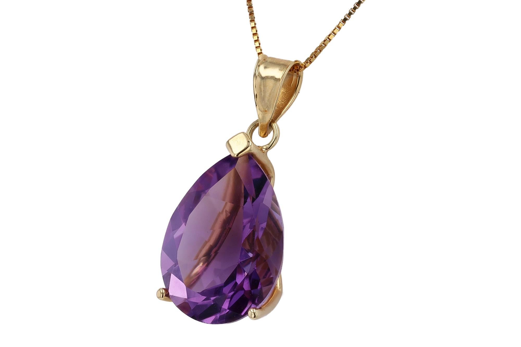 Sustainable and attainable, this vintage amethyst pear shaped pendant is equal parts affordable and luxurious. Artisan crafted with 14k yellow gold suspended from a silky box chain. The vivid, violet-purple natural gemstone weighs 7.35 carats and is