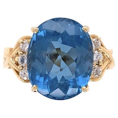 Vintage 7.50 Carat Oval Blue Topaz and Diamond Gold Statement Ring