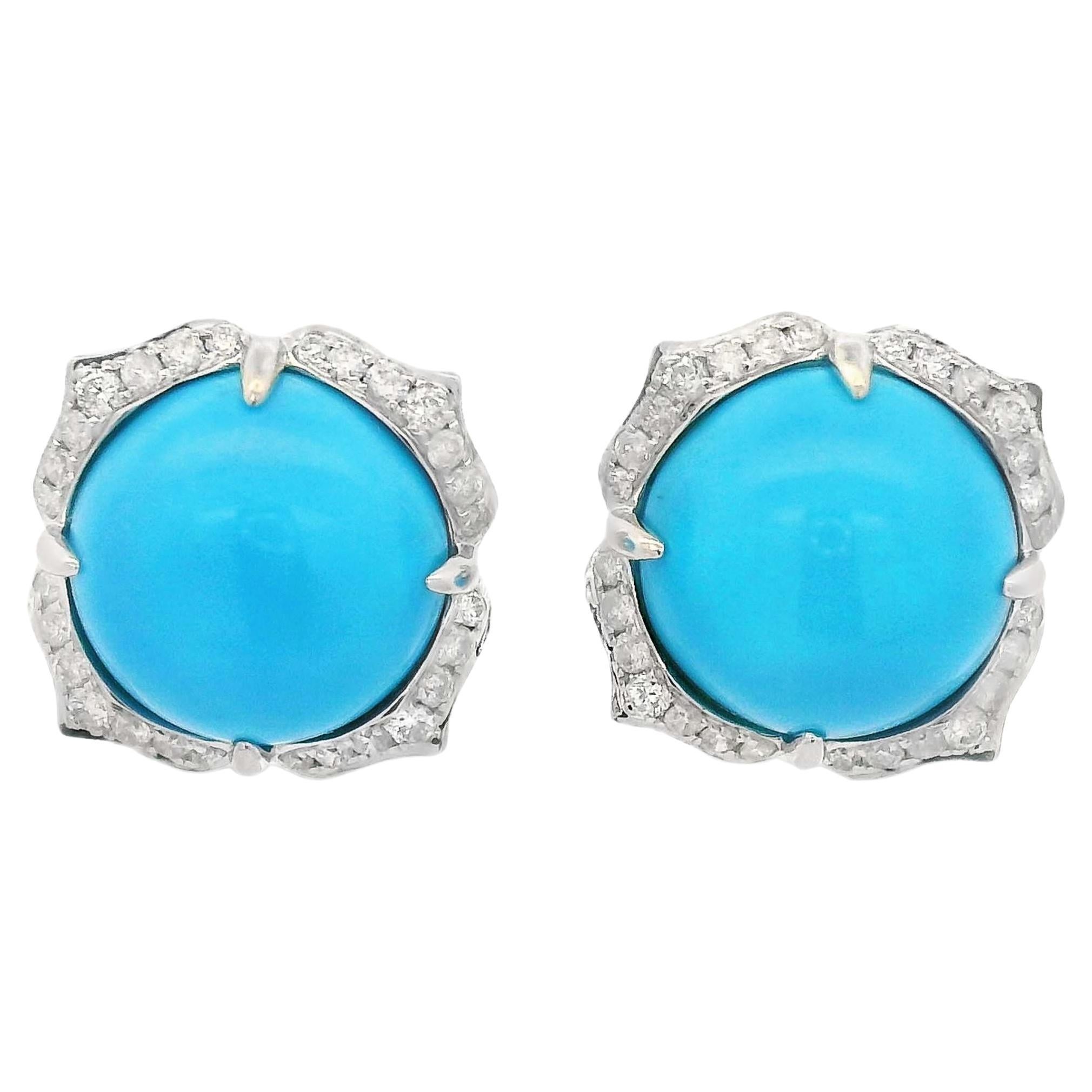 Perfect balance of sophistication and natural beauty.  Showcasing 7.59 carats of hand-selected turquoise, these earrings exude a calming vibrancy, reminiscent of clear blue skies and tranquil waters.  Each turquoise cabochon is carefully nestled