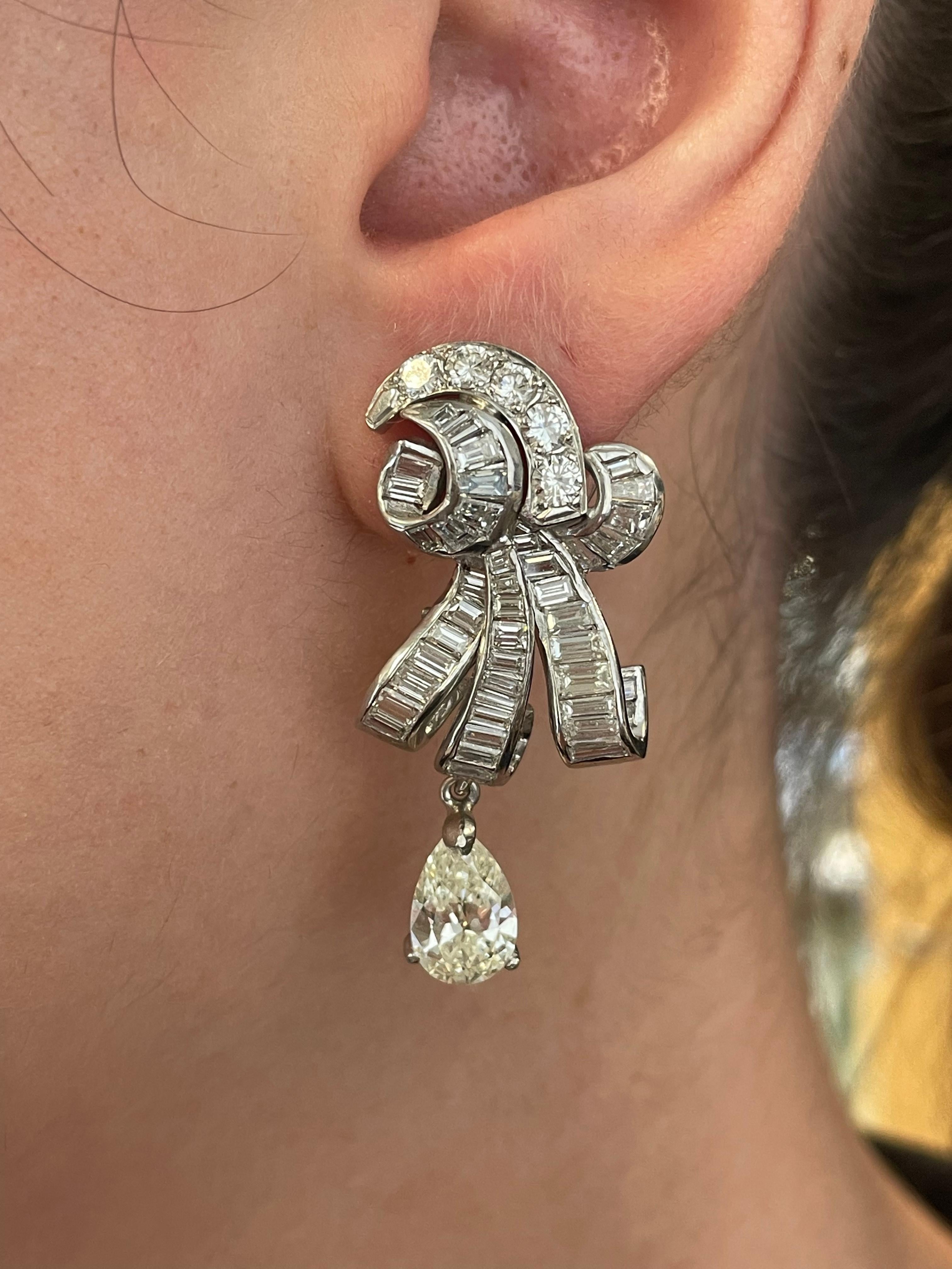 Stunning vintage pear diamond earrings. High jewelry sold by Alexander Beverly Hills. 
Approximately 7.85 carats total diamond weight. 
2 pear brilliant diamonds, apx 1.80 carats. Apprximately J/K color and VS clarity. Complimented by approximately