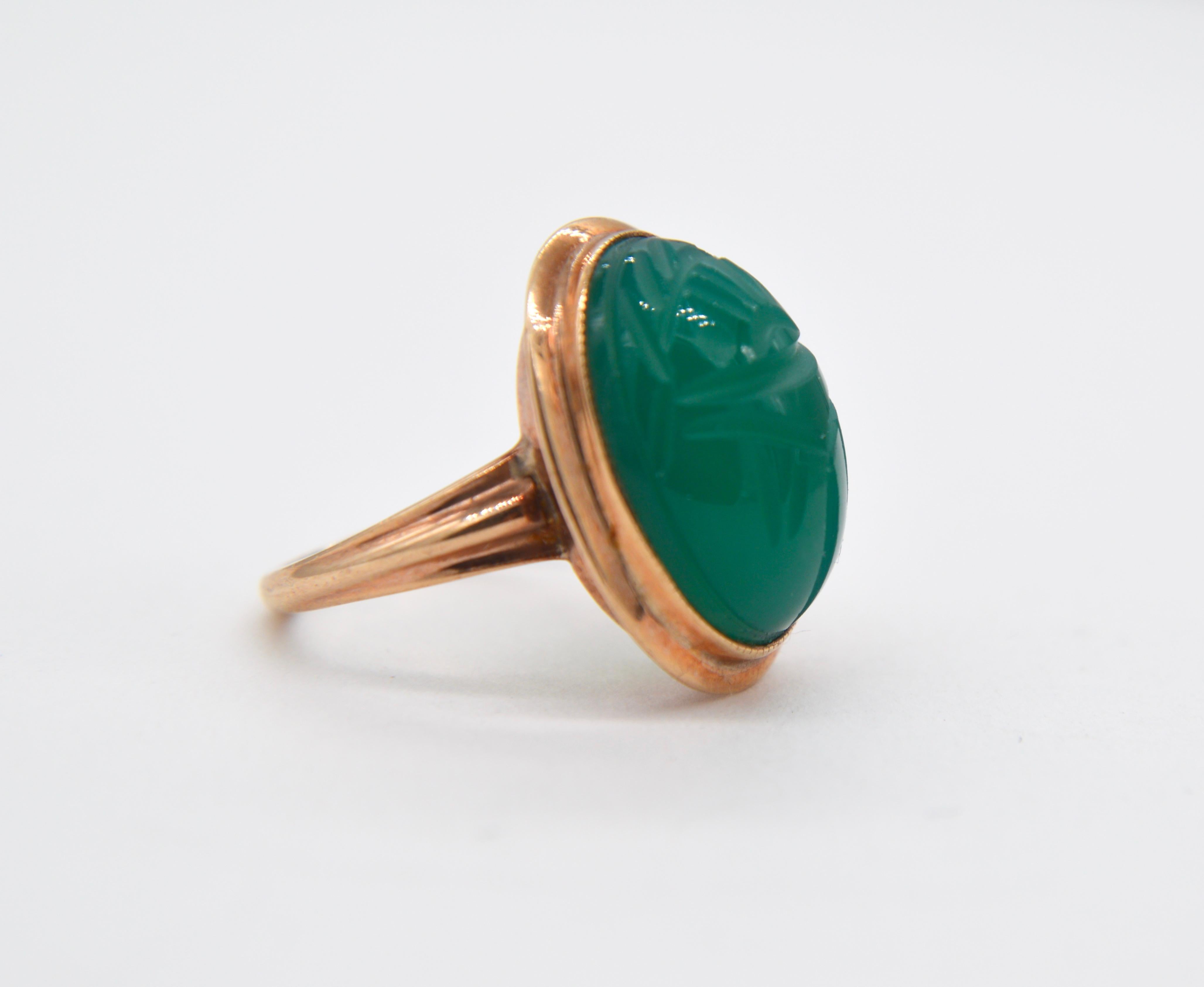 Stunning vintage midcentury era chrysoprase 10K yellow gold scarab beetle Egyptian revival ring. Size 4, can be resized by a jeweler. Ring is marked as 10K gold. In very good condition, but there is a faint mark where the ring was once resized on