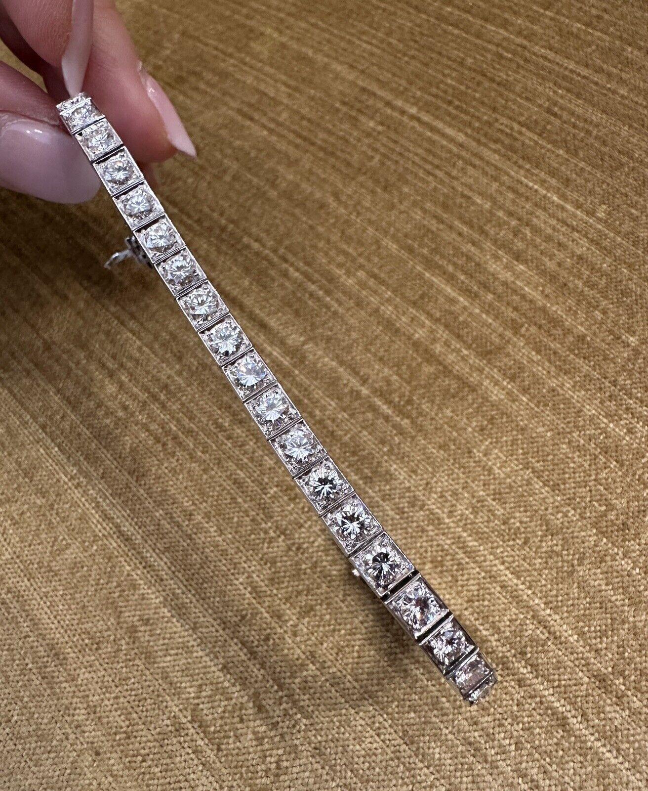 Vintage 8 carats Diamond Tennis Line Bracelet in Platinum

Vintage Diamond Bracelet features 34 Round Brilliant Cut diamonds set in a high polished platinum setting. Bracelet is secured by a squeeze tongue clasp with safety bar and safety