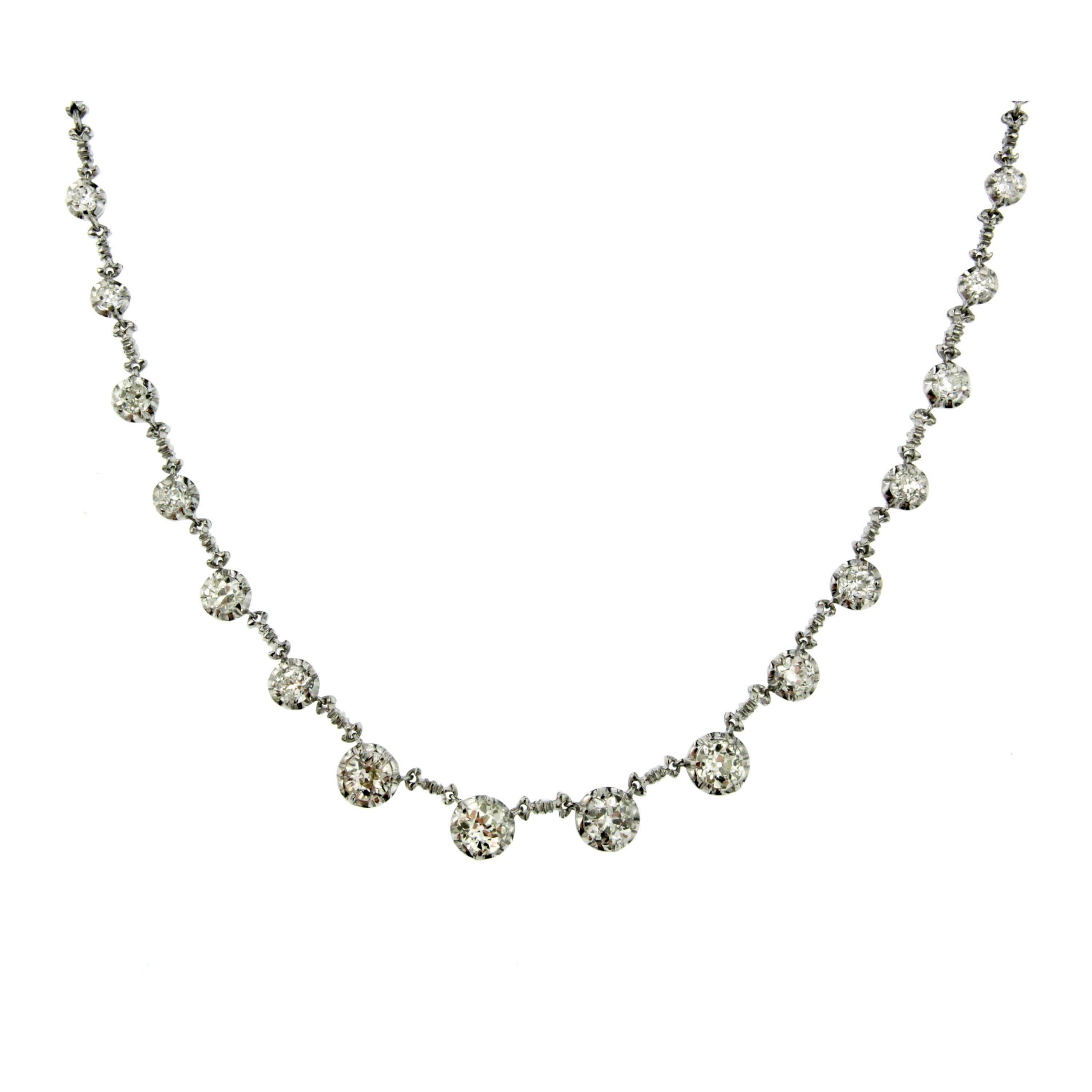 An exquisite Gold Diamond necklace set with 8.00 carats of Sparkling old mine cut Diamonds graded from I to K Color with VS2 to SI clarity.
Exclusively hand crafted by great Italian masters craftsman from precious 18k white gold. Circa