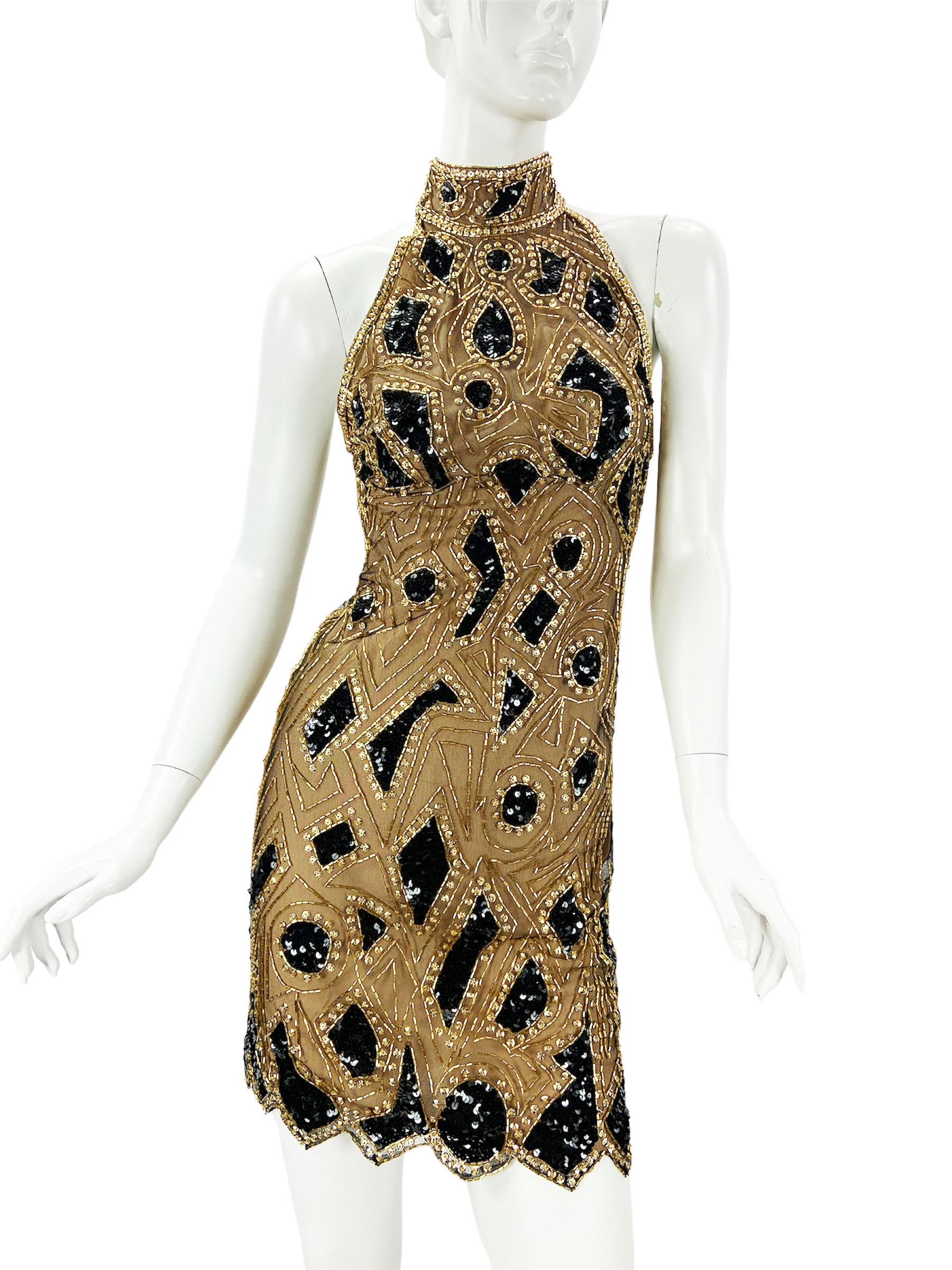 Vintage 80's Bob Mackie Gold Black Embellished Mini Dress
If you’re a fan of Fran, she wore this same dress in 1991 on the show “Princesses”.
US size - 4
Exquisitely Beaded in Gold and Black  Sequins and Beads over the Black Tulle,  
Nude Color